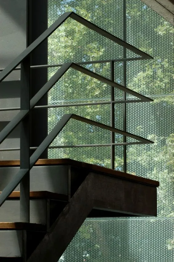 Steel staircase with stainless steel handrail
